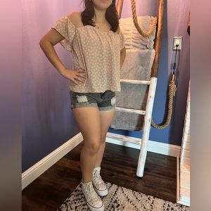 Dainty daisy off the shoulder NWOT flowy shirt with flutter sleeves.